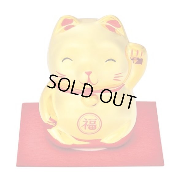 開運笑顔　金の福まねき猫貯金箱　の写真